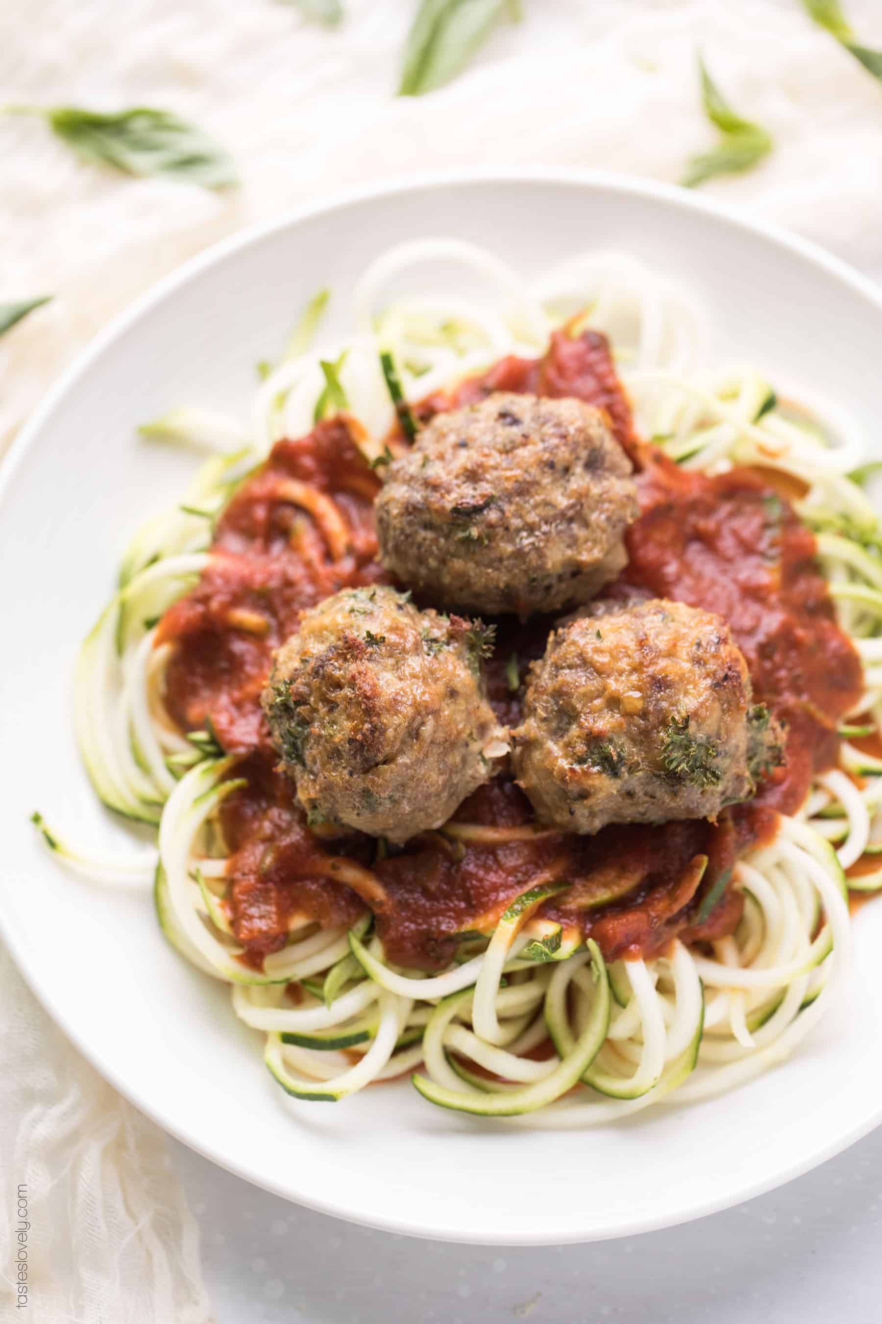meatballs on a plate with zucchini noodles