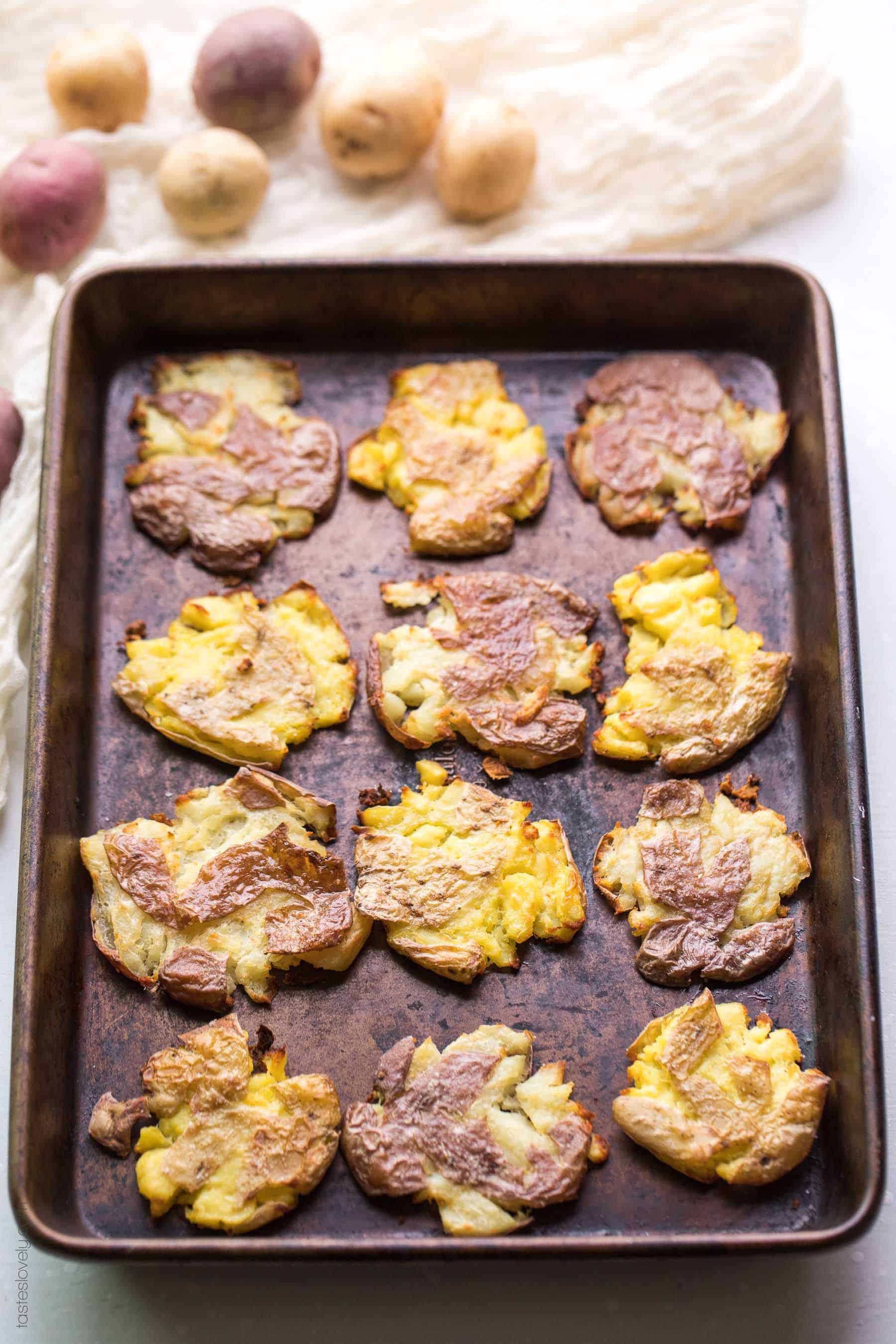 Paleo & Whole30 Crispy Smashed Potatoes - soft and fluffy on the outside, crispy and golden brown on the outside. The most delicious side dish recipe! Gluten free, grain free, dairy free, sugar free, clean eating, vegan.