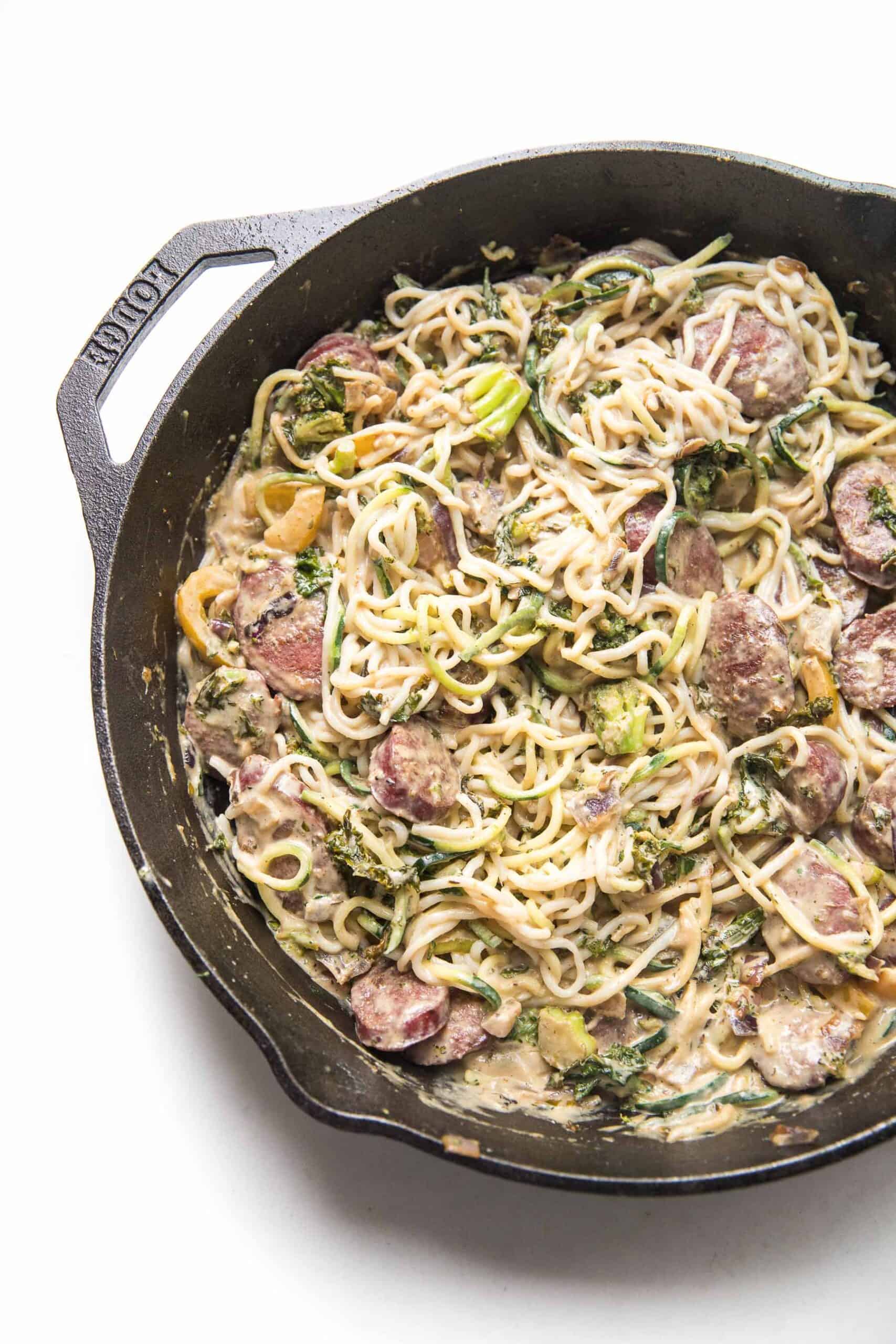 creamy pasta in a cast iron skillet