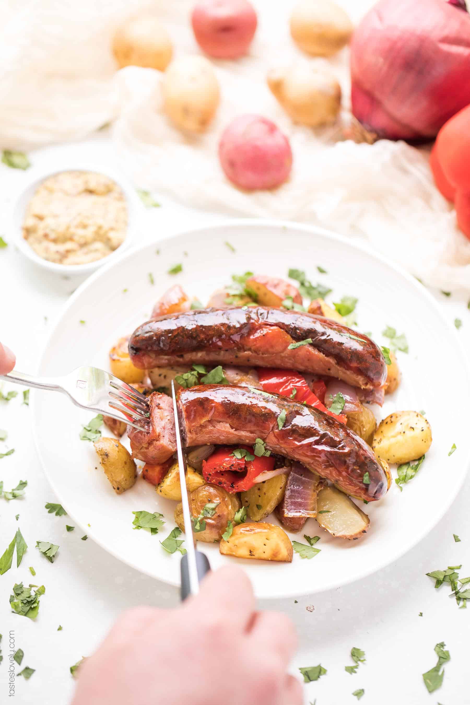 Paleo + Whole30 Sheet Pan Sausage, Bell Pepper and Potato Roast - a super quick and healthy breakfast or dinner recipe! Just 10 minutes of prep, and the oven does the rest of the work for you. #paleo #whole30 #glutenfree #grainfree #dairyfree #sugarfree #keto #cleaneating #realfood