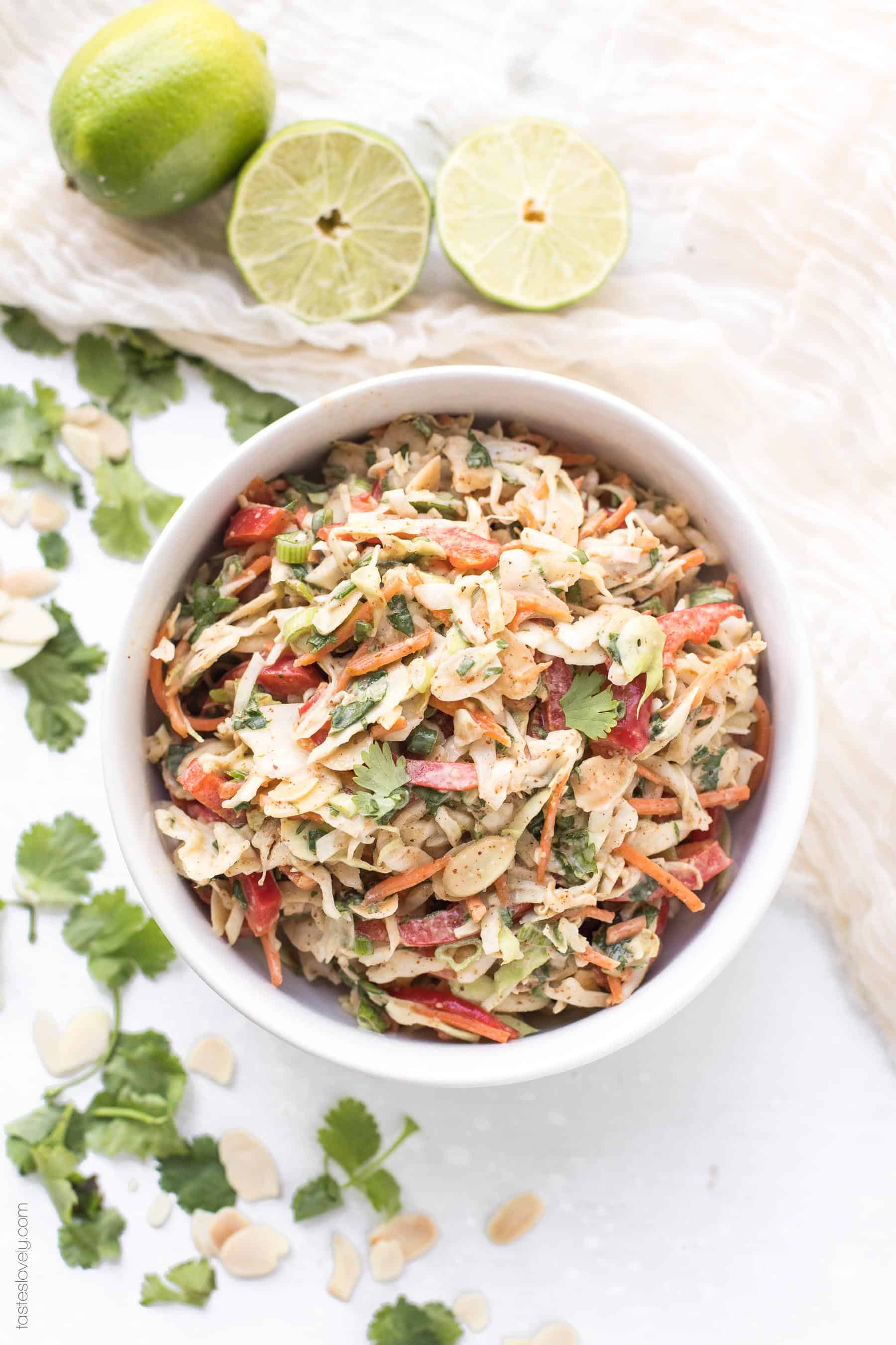 Paleo + Whole30 Thai Almond Butter Coleslaw Recipe - a healthy and easy coleslaw tossed in a paleo + whole30 chicken satay sauce made with almond butter. #glutenfree #grainfree #dairyfree #refinedsugarfree #keto #cleaneating #realfood