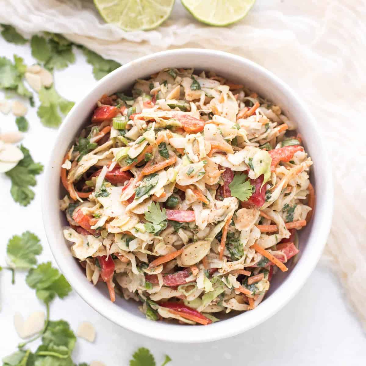 https://www.tasteslovely.com/wp-content/uploads/3000/04/Paleo-Whole30-Thai-Almond-Butter-Coleslaw-tasteslovely.com_.jpg