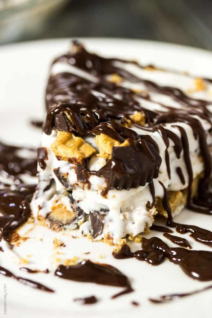 Peanut Butter Lovers Ice Cream Pie - a no bake dessert with a NUTTER BUTTER crust, vanilla and peanut butter cup ice cream filling, and a peanut butter chocolate sauce drizzled on top
