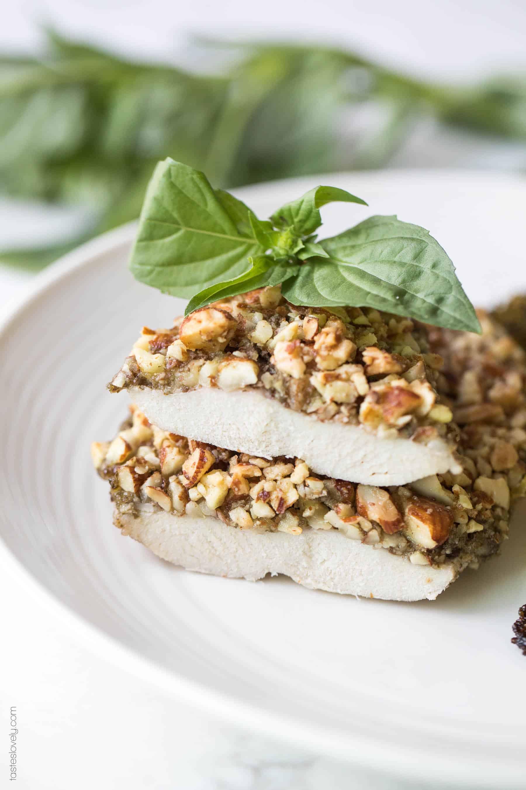 Paleo + Whole30 Almond Crusted Pesto Chicken - a quick and healthy 30 minute dinner recipe! #paleo #whole30 #glutenfree #grainfree #dairyfree #sugarfree #keto #cleaneating #realfood