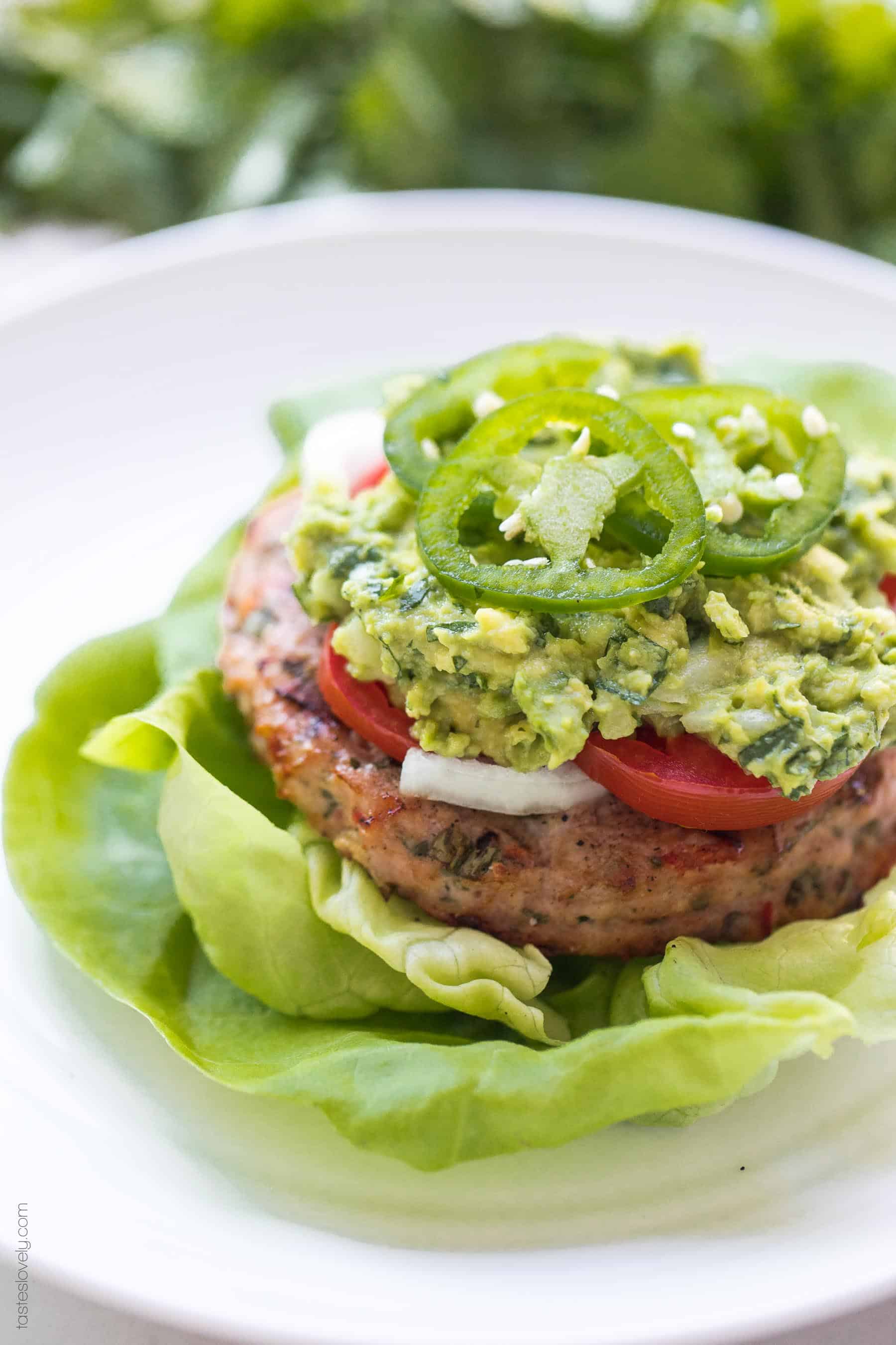 Paleo + Whole30 Mexican Turkey Burger Recipe - turkey burgers packed with Mexican flavor and topped with guacamole. A delicious and healthy 30 minute dinner! #paleo #whole30 #keto #glutenfree #grainfree #dairyfree #sugarfree #cleaneating #realfood