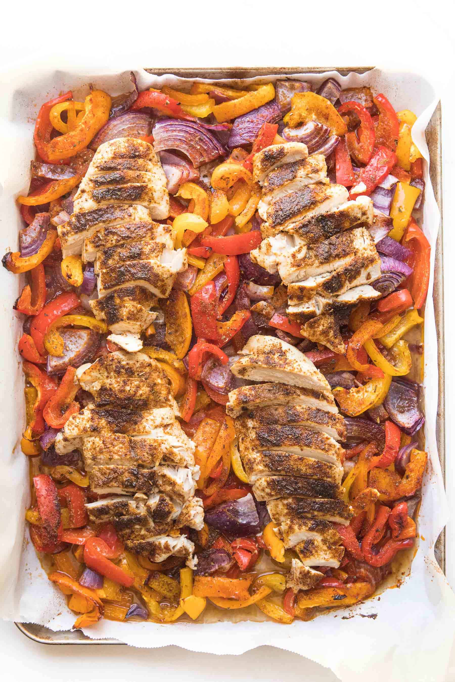 chicken fajitas on a sheet pan