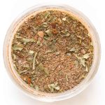 jamaican jerk seasoning in a mason jar on a white background