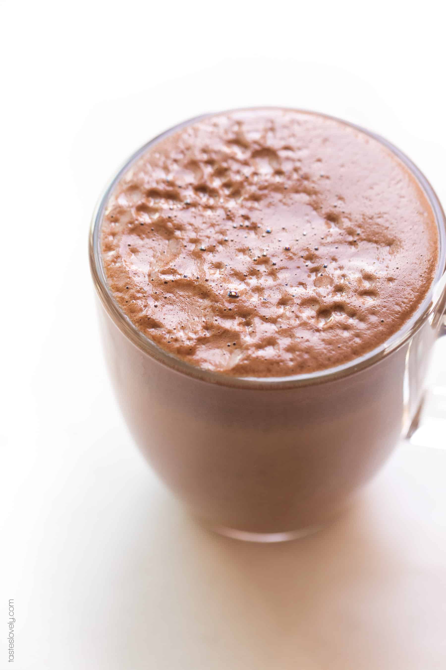 A close up shot of a mocha in a coffee cup