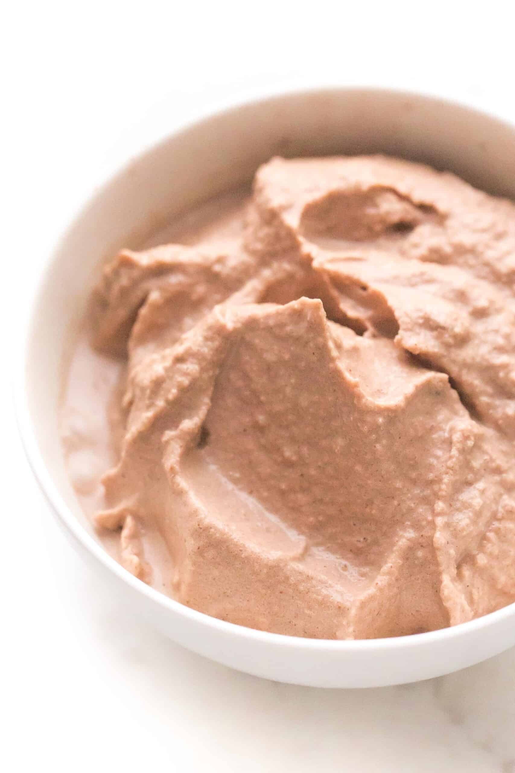 chocolate frosty in a white bowl and background