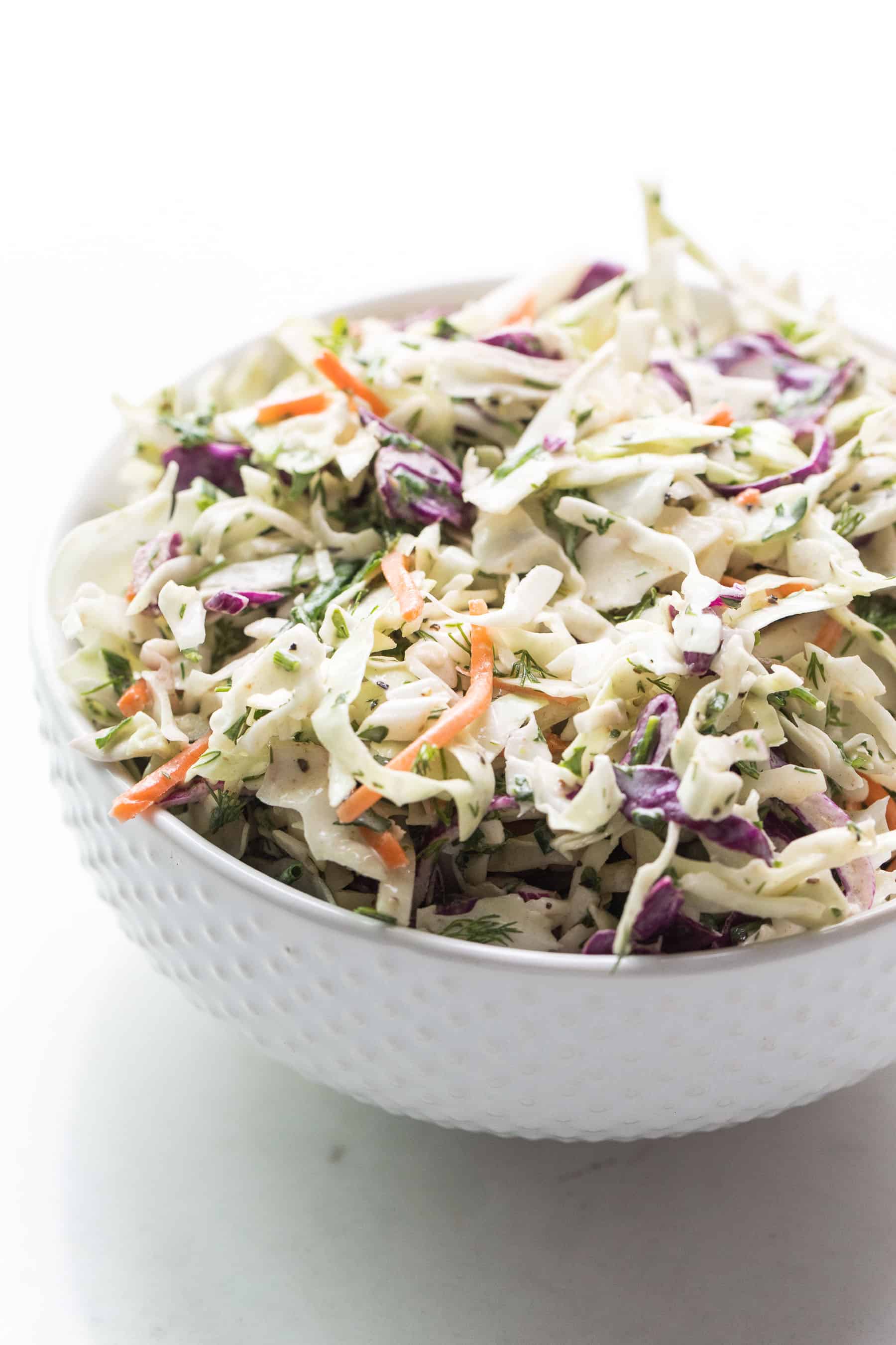 Coleslaw in a white bowl